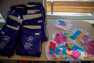 Literacy kits next to craft paper
