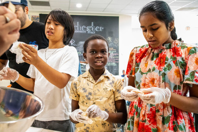 Group of kids making fondant