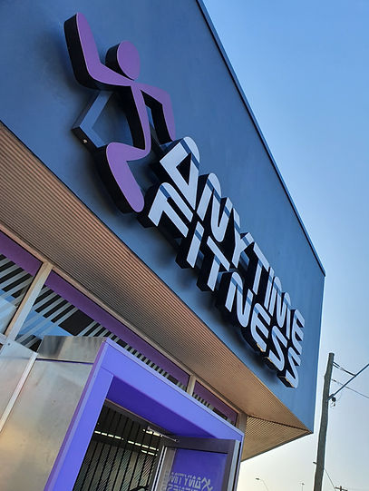 Vibrant Purple and White 3D Illuminated Anytime Fitness Sign on Local Sign Company Vibe Signs' Page