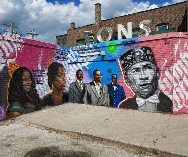Colorful mural by a local Chicago artist celebrating Black and Brown culture