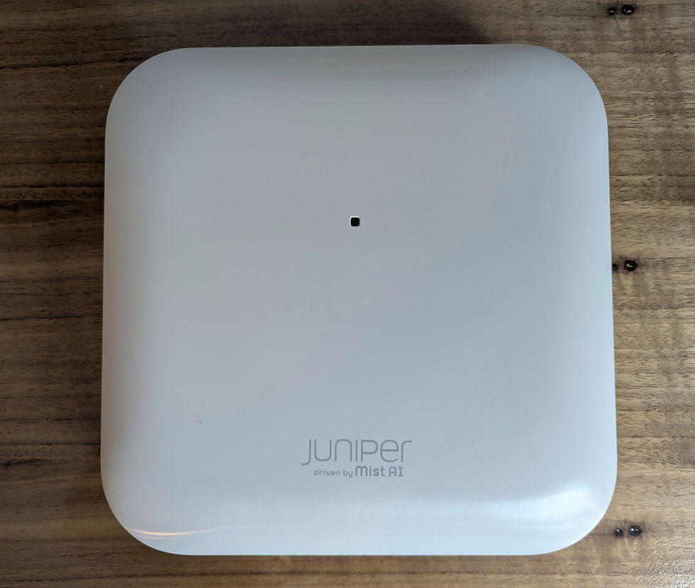The finish on the top cover is smooth and shiny as this particular unit was not assembled by the fab plant. Production devices will have the typical textured matte finish.