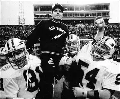 Decades after that eighty-yard punt return silenced a high school dance, Ken Hatfield was still being carried on his players' shoulders — this time as head coach at Air Force.