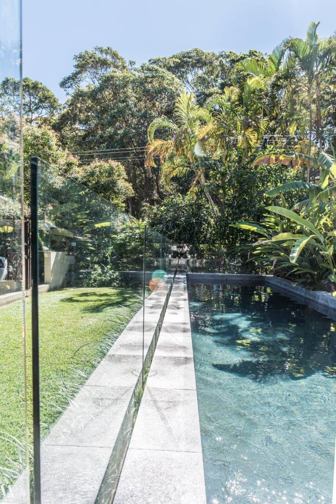 North facing sun-drenched heated pool level with living and play areas