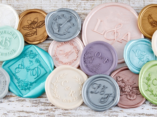 Custom wax seal for wedding and event invitations, featuring a personalized monogram and elegant finishing details by Violet Invitations in Ronkonkoma, Long Island, New York.