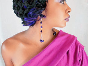 model wearing black Puff lace snoodie by Purple Party Design and 3-crystal dangle earrings. s
