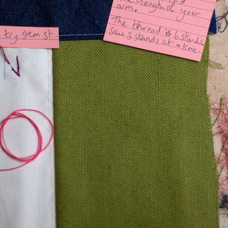 A lay of Karen Taylor's Pin Cushion kit with hand written notes