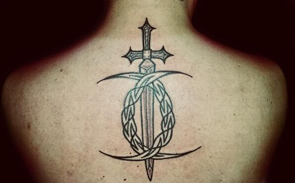 sword tattoo on back inspired by game of thrones and viking, celtic, pagan art Design Idea Tattoos by Captain Bret and Celtic Tattoo. Newport, RI