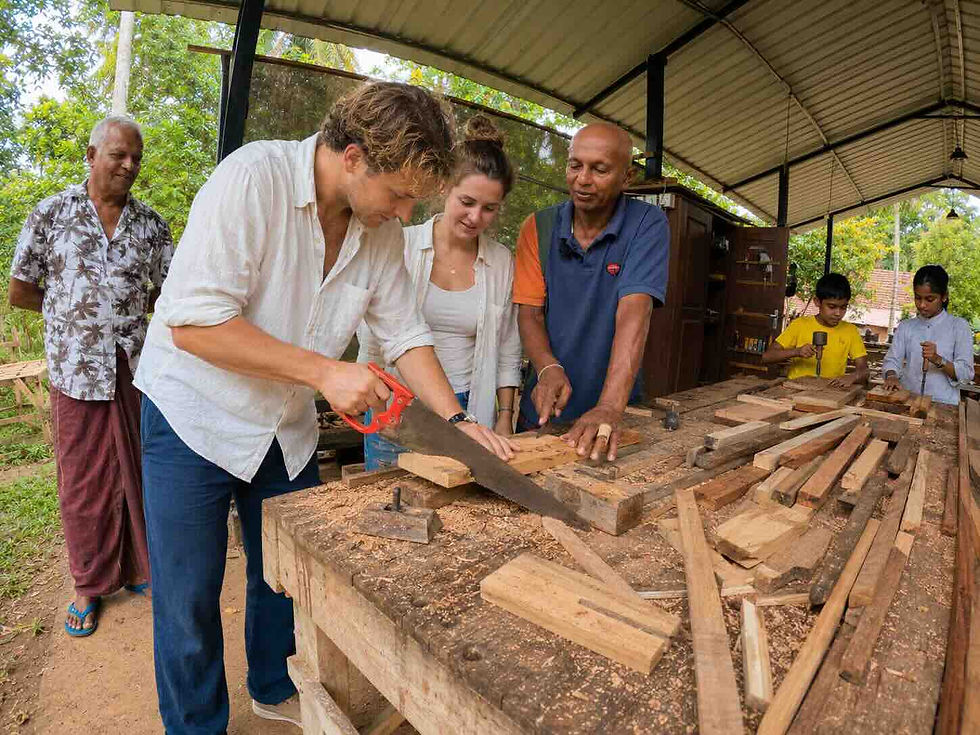 Sri Lankan artisan demonstrating traditional woodworking at Woody Land Artisans