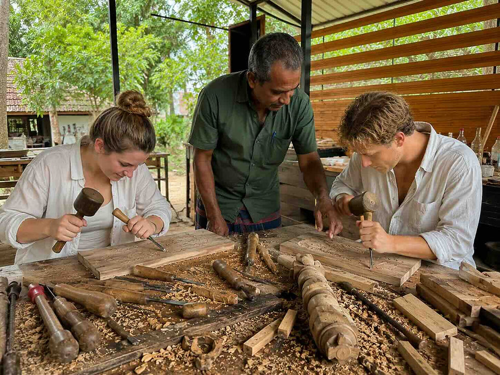 Travellers participating in a Sri Lanka wood carving workshop at Woody Land Artisans