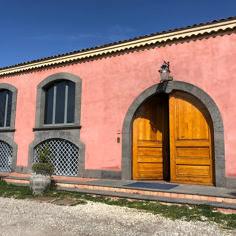 pink coloured wine cellar in Tenuta Terre Nere winery in Etna wine region Sicily