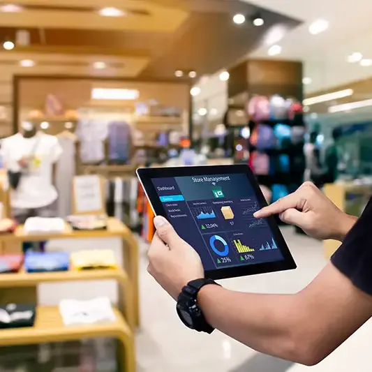 smart-store-management-systems-conceptmanager-using-digital-tablet-blurred-store-as-backgr