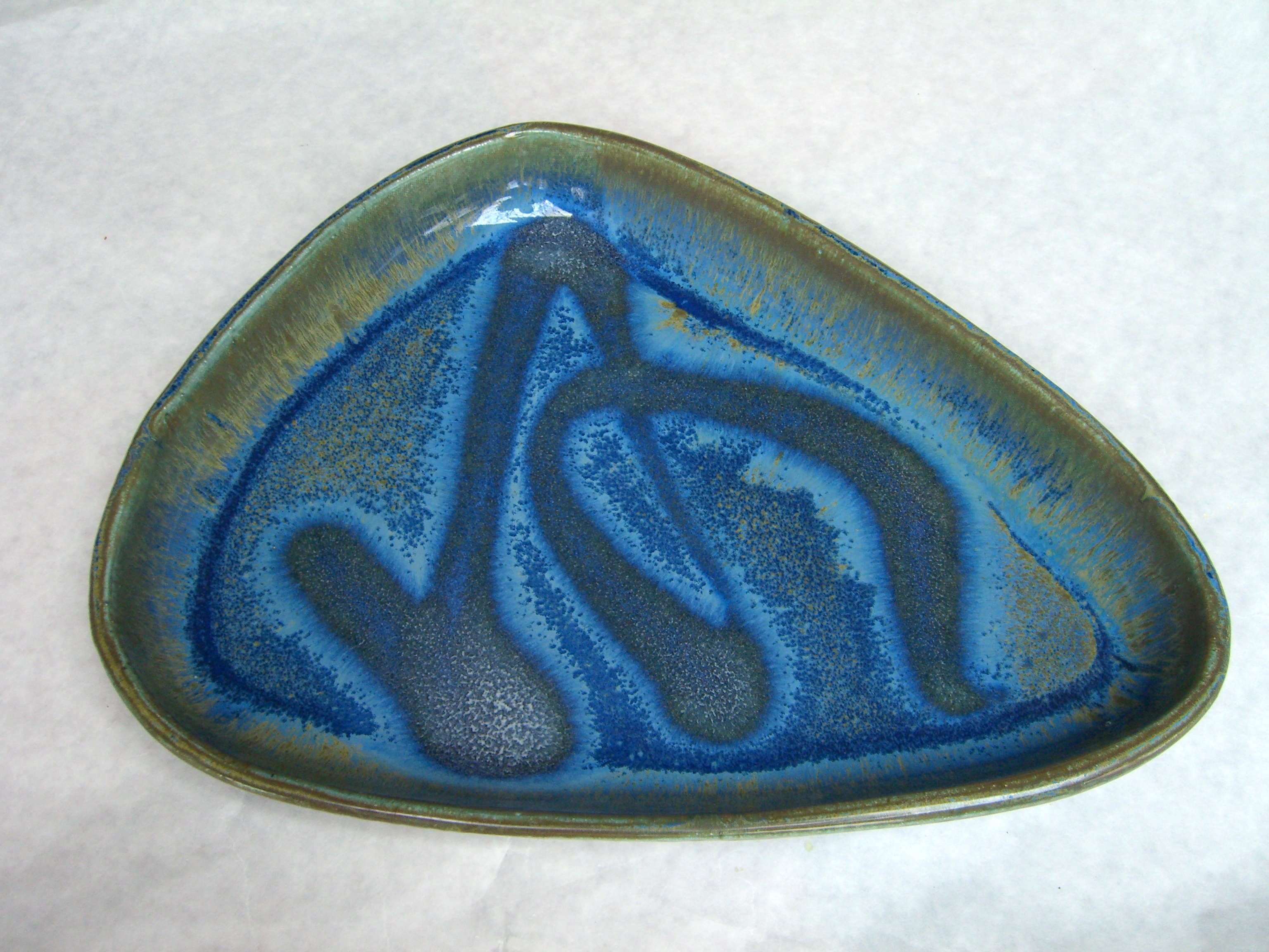 Bronze blue halo triangle