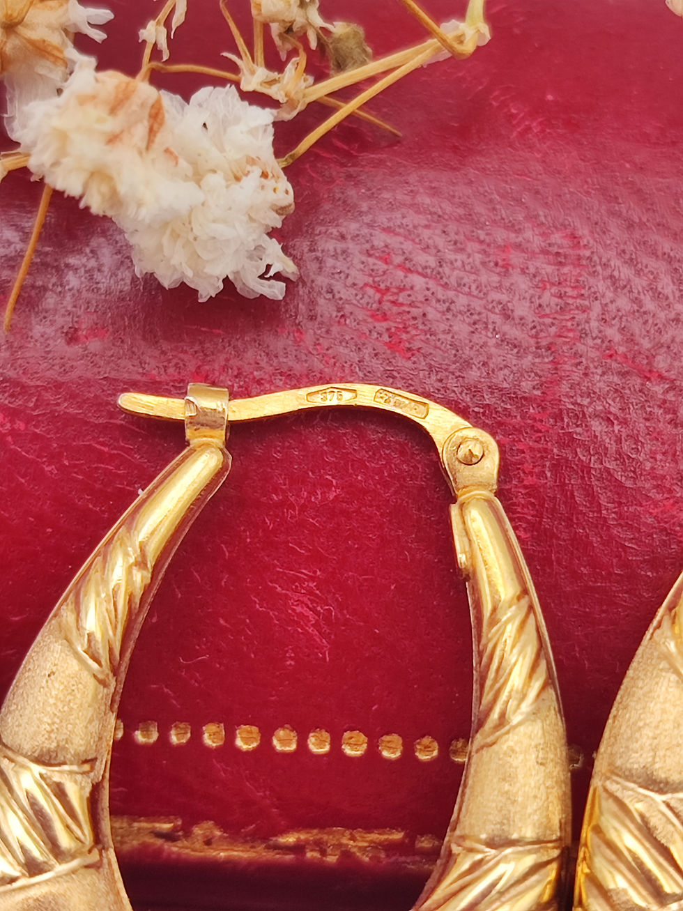 Thumbnail: UnoAerre 9ct elongated textured hoops