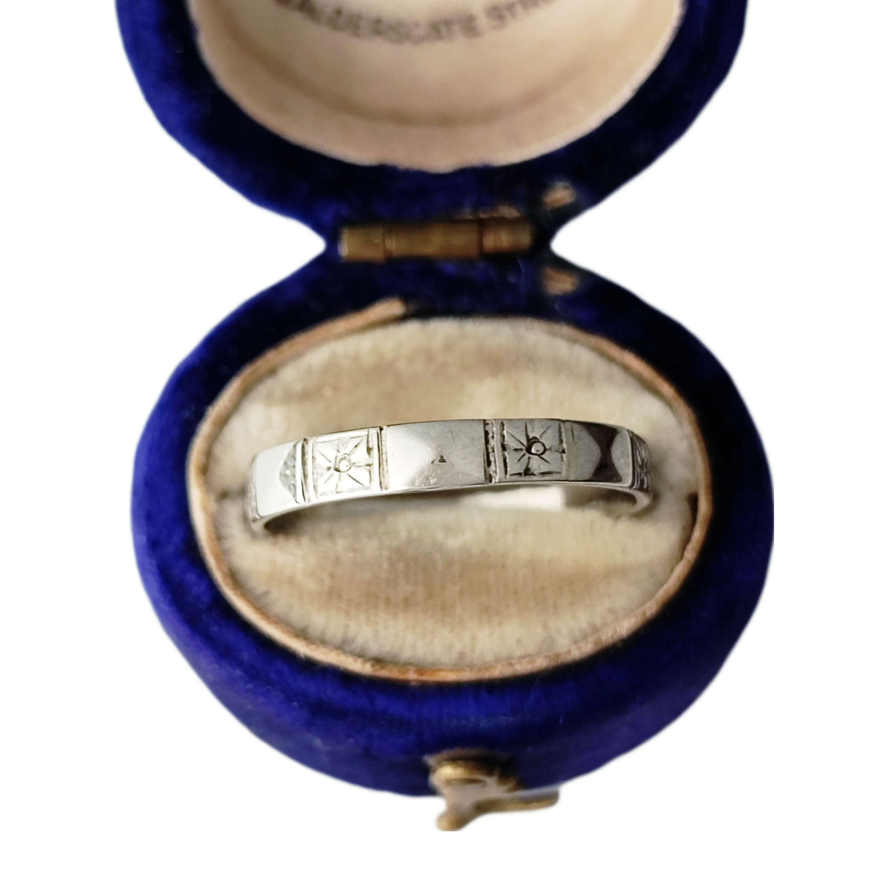 Platinum floral engraved stacking band 