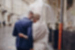Groom and Bride under Umbrella