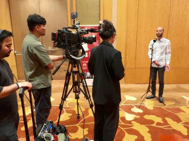 Photo 1: A CNN interview taking place during the SG60 Tribute Luncheon.
