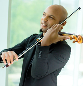 Dr. Immanuel Abraham, an African-American, male, violinist
