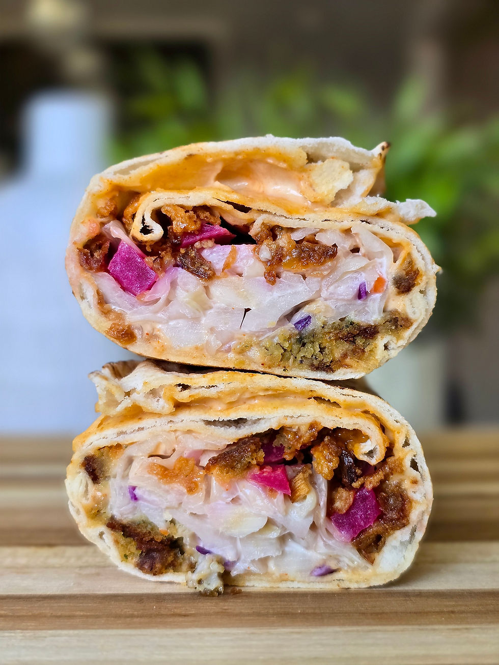 Need a quick and filling 10-minute lunch? Enter Falafel Wrap! The secret to making a great falafel wrap is using quality ingredients. Just grab your favourite frozen falafel, and pick up some fresh hummus, pita bread and coleslaw from your local Mediterranean shop. You’ll have a delicious and satisfying wrap ready in minutes!