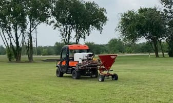 Spreading Granular Fertilizer