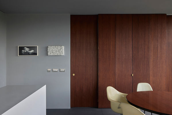 Timber-clad monolith at Clerkenwell Rooftop slid forward to create the guest bedroom on the other side, with the monolith’s side doors swung out to provide privacy.