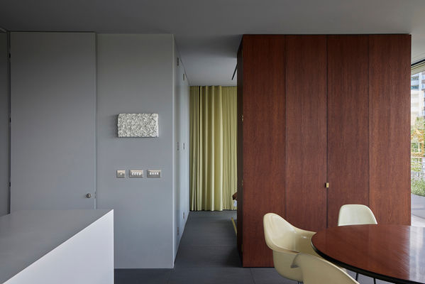 Timber-clad monolith at Clerkenwell Rooftop slid forward to create the guest bedroom on the other side, with the studio doors closed.