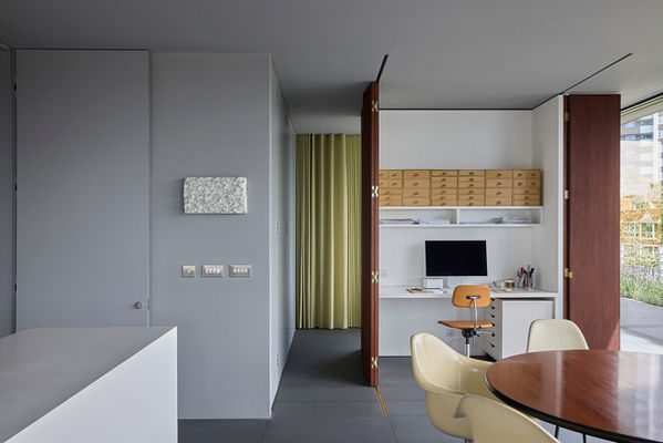 Timber-clad monolith at Clerkenwell Rooftop in its usual position maximising the open-plan living space, with its studio doors open.