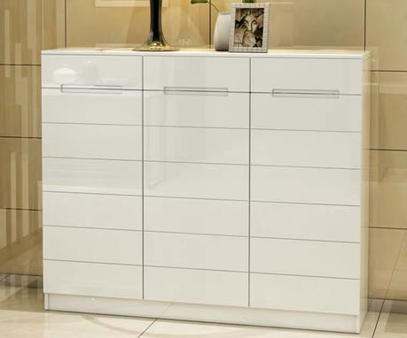 Custom minimalist hallway shoe cabinet by Cosmos Decor Renovation, custom carpentry and interior design in Singapore