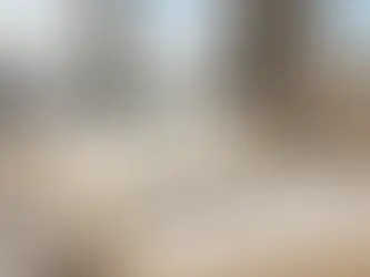 An essential planning layout on a wooden desk showing a 4-room HDB floor plan, a design checklist, and a sample board, illustrating the critical preparatory steps taken before engaging a direct renovation contractor in Singapore.