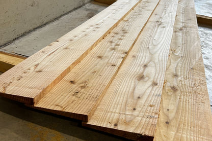 Larch feather edge cladding