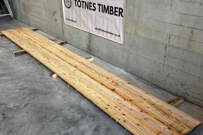 Larch feather edge cladding