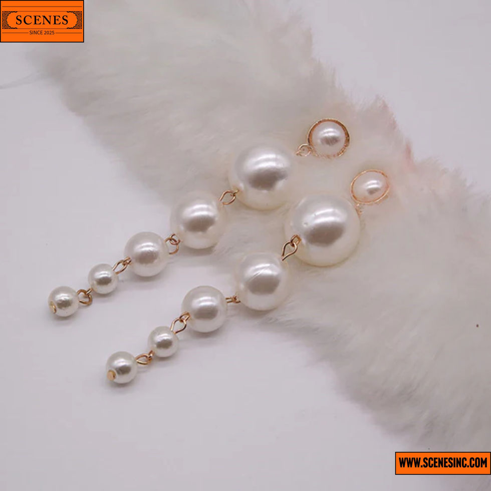diagonal top shot of Scintillating Chunky Statement Pearl Drop Ear-Rings