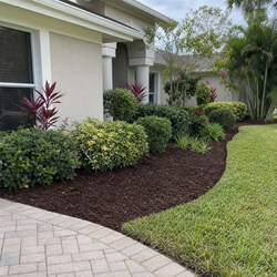 Finished planting bed and lawn for stronger listing photos