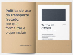 Uma pasta com o termo de adesão da política do transporte fretado