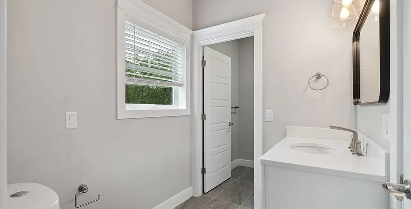 Luxury guest bathroom with custom tile design and modern fixtures in Porto Cima.