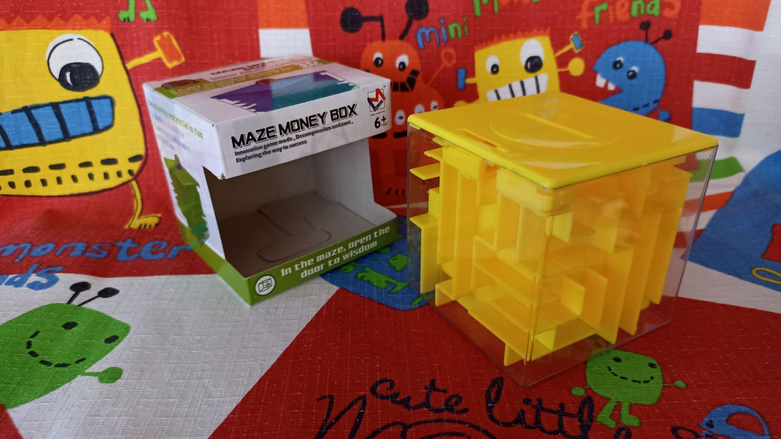 Alcancía laberinto 8.5cm amarillo