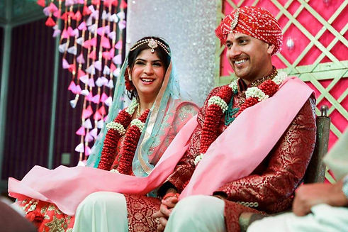 Newly married Indian couple smiling after their wedding