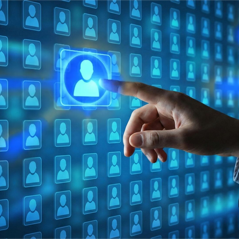 Business professional selecting candidate profile on digital recruitment interface