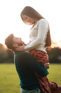 Most perfect couple in london looking at each other during couple photoshoot in summer at london