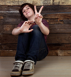 iStock-182755075 teen w peace sign.jpg