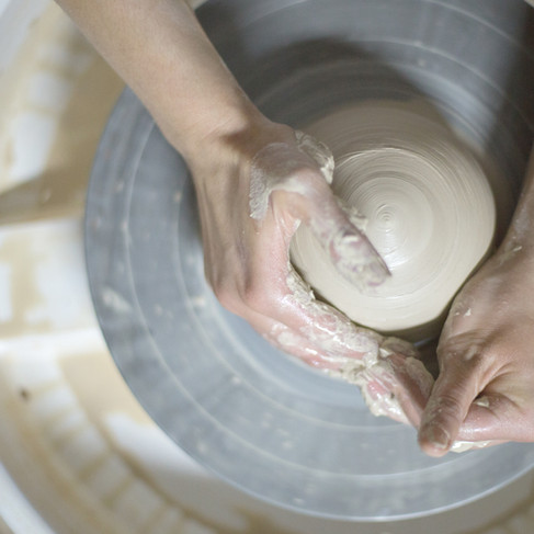 Arika Lau teaching Pottery at The HeART Collective