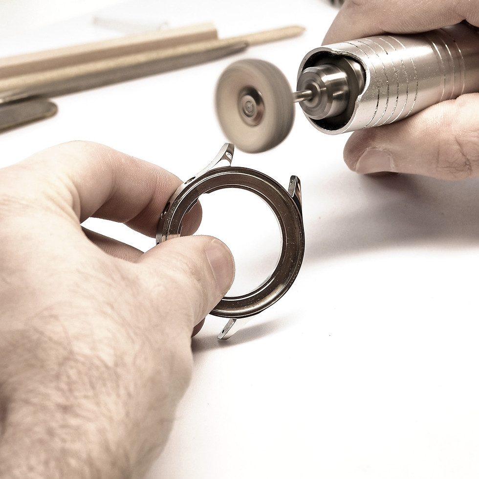 polishing the watch case by hand