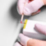 lacquering of the chronograph hand with red color