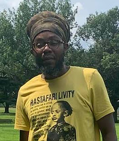 Picture of Jah Evans wear a Rastafari livity t-shirt