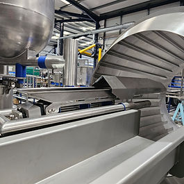 Our fully stainless vibratory conveyors are engineered with a hygienic solid round bar design, ideal for evenly distributing seasoning within a drum or gently conveying product along your process line. The open-frame construction allows complete accessibility for cleaning, while the fully wipe-down design supports strict hygiene standards. Built for durability and consistent performance, these conveyors provide reliable product movement while minimising build-up and simplifying sanitation in demanding food production environments.