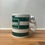Thumbnail: A Celtic State of Mind's merchandise line includes a home edition mug.