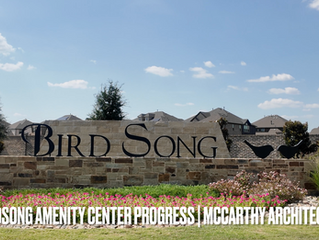 Entrance monument sign for Birdsong community in Mansfield, Texas, featuring stonework, landscaping, and the Bird Song name, home to the new amenity center by McCarthy Architecture.