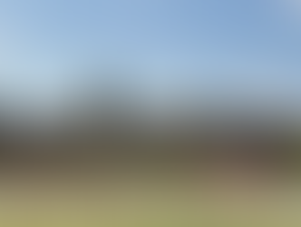 Entrance monument sign for Birdsong community in Mansfield, Texas, featuring stonework, landscaping, and the Bird Song name, home to the new amenity center by McCarthy Architecture.