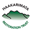 Hakarimata Haakarimata Restoration Trust Logo, showing text surrounding green hills