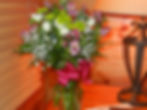 A sweet bouquet in a glass vase