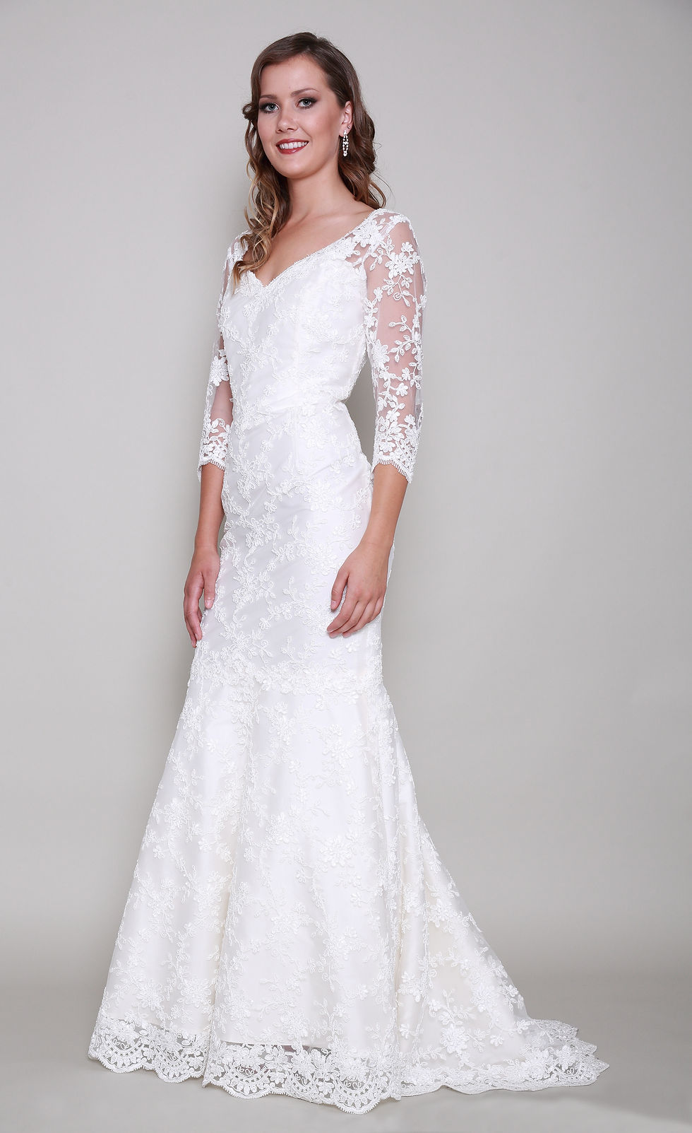 Thumbnail: A high fashion model wearing a Lorellana Couture Mother of the Bride dress